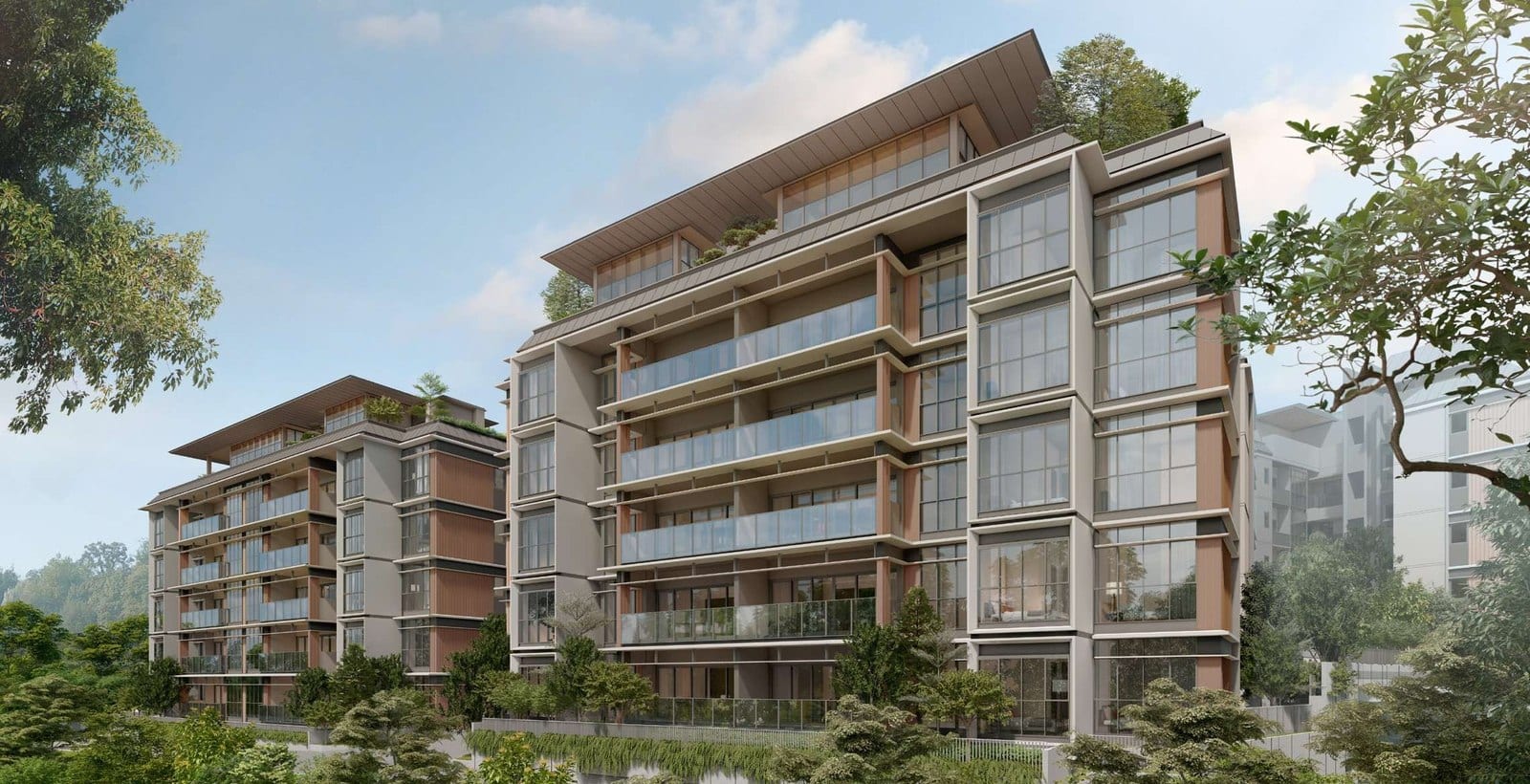 Artist's impression of Watten House's low-rise apartment blocks, with pitched metal roofs, floor-to-ceiling glass and timber-toned accents set among mature trees under a blue sky.